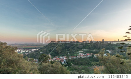Panorama showing sunset over the Castle of Almourol on hill in Santarem aerial timelapse. Portugal 116405243