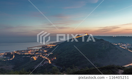 Panorama showing aerial view of Sesimbra Town and Port day to night timelapse, Portugal. Panorama showing aerial view of Sesimbra Town and Port day to night timelapse, Portugal. 116405251