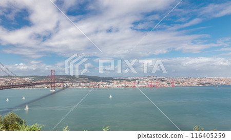 Panorama showing Lisbon cityscape and Tagus river timelapse with 25 of April bridge Panorama showing Lisbon cityscape and Tagus river timelapse with 25 of April bridge 116405259