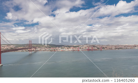 Panorama showing Lisbon cityscape and Tagus river timelapse with 25 of April bridge 116405260