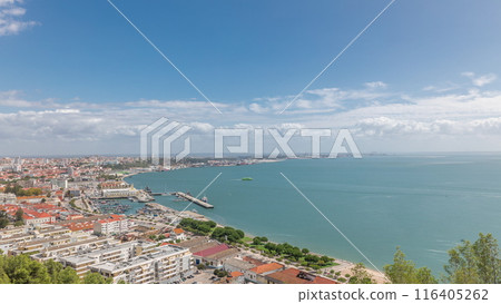 Panorama showing aerial view of marina and city center timelapse in Setubal, Portugal. 116405262