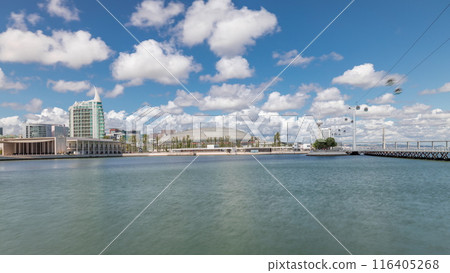 Panorama showing Parque das Nacoes or Park of Nations district timelapse in Lisbon, Portugal. Panorama showing Parque das Nacoes or Park of Nations district timelapse in Lisbon, Portugal. 116405268