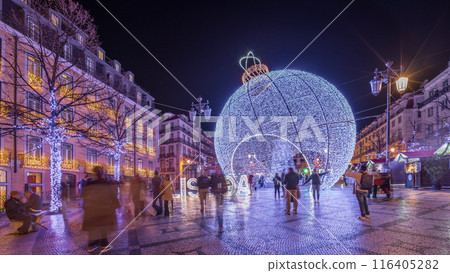 Panorama showing Christmas decorations with big ball on Luis De Camoes square night timelapse. 116405282