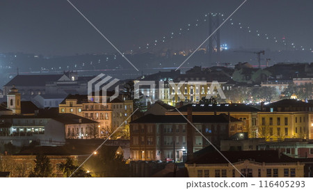 Aerial view towards Barrio Alto and 25th of April Bridge night timelapse, Lisbon, Portugal. Aerial view towards Barrio Alto and 25th of April Bridge night timelapse, Lisbon, Portugal. 116405293