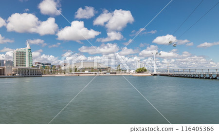 Panorama showing Parque das Nacoes or Park of Nations district timelapse in Lisbon, Portugal. 116405366