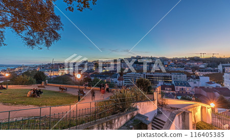 Panorama showing Jardim do Torel day to night timelapse with views to the city center of Lisbon after sunset. Portugal 116405385