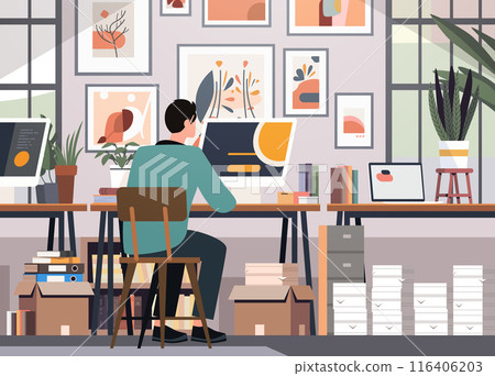 Person working at desk in creative office workspace with plants books and wall art modern interior design Person working at desk in creative office workspace with plants books and wall art modern interior design 116406203