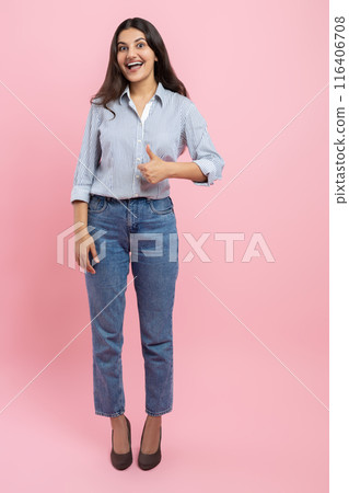 Full length of Indian woman showing like gesture 116406708