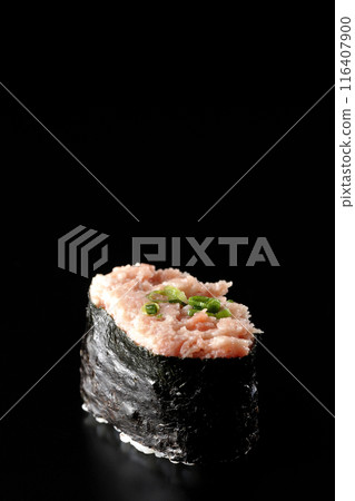 Negitoro gunkanmaki photographed against a black background 116407900