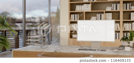 A modern private office features a computer, a large bookshelf, and a view through the balcony. 116409135