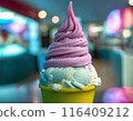 Frozen yogurt in blue and pink color in yellow cup. The background is blurred.   116409212
