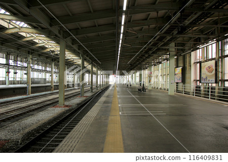 An empty Shinkansen platform at a station An empty Shinkansen platform at a station 116409831