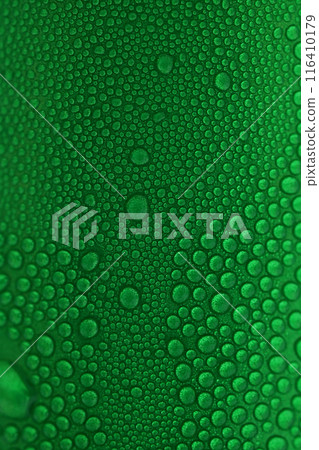 water drop on green beverage cans background, texture of cold aluminium drink package 116410179