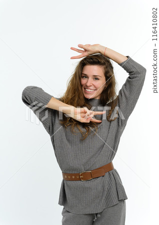 Attractive young woman on a white background. 116410802