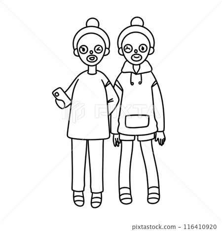 Two people are standing next to each other, one of them holding a cell phone Two people are standing next to each other, one of them holding a cell phone 116410920