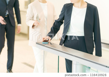 Hands of a person passing through a security gate Hands of a person passing through a security gate 116410928