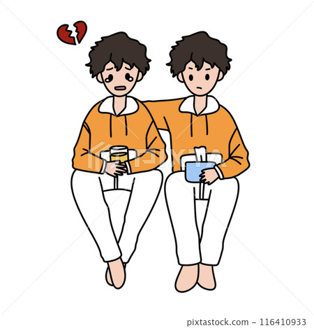 Two young men sitting on a bench, one of them holding a cup 116410933