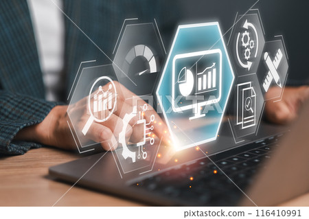 A business professional using a laptop with digital icons representing data analysis, performance tracking, and monitoring concepts. 116410991