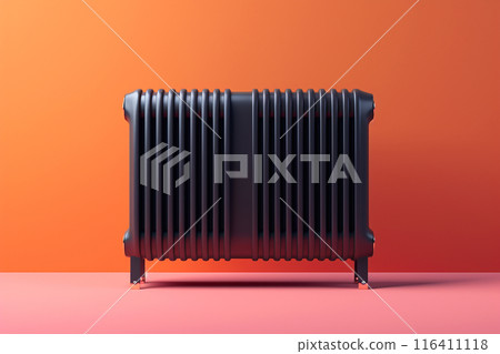 Black radiator on an orange background, highlighting the concept of heat and heating costs 116411118