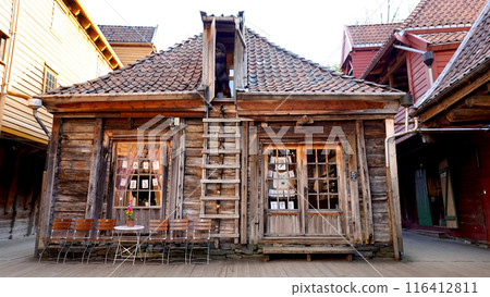 BERGEN, NORWAY Exterior of Norway fishermen's houses next to the fjord in Bergen BERGEN, NORWAY Exterior of Norway fishermen's houses next to the fjord in Bergen 116412811