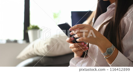 Young beautiful woman look camera holds Young beautiful woman look camera holds 116412899