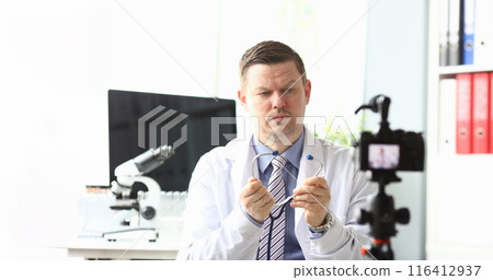 Concerned male practitioner Concerned male practitioner 116412937