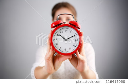 Adult smiling caucasian woman hold red 116413068