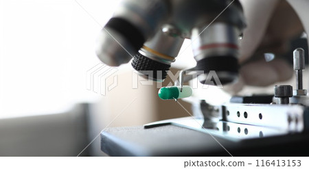 Green and white cannabis capsule 116413153