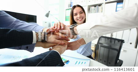 Group of people in suits crossed hands Group of people in suits crossed hands 116413601