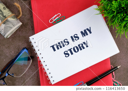 Business and This is my Story concept. Copy space. Words THIS IS MY STORY in the manager's address book Business and This is my Story concept. Copy space. Words THIS IS MY STORY in the manager's address book 116413650