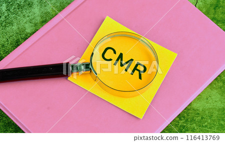 Business acronym, CMR Contract Management Review or Clear Motion Rate. CMR through a magnifying glass on a yellow sticker, a concept photo 116413769