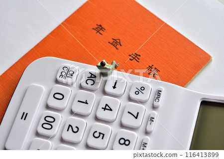 Salaryman worried about the future, pension book and calculator Salaryman worried about the future, pension book and calculator 116413899
