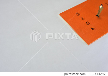 Salaryman worried about the future, pension book and calculator Salaryman worried about the future, pension book and calculator 116414297