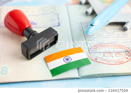 Bangkok, Thailand, March 1, 2024 India flag with approved Stamp visa and passport document to immigration at airport in country. 116417509