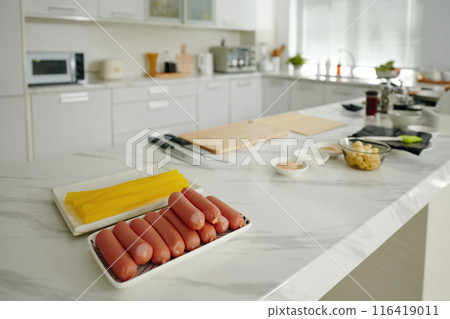 Kitchen Table With Ingredients For Dish 116419011
