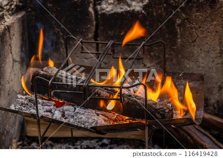 Quiet bonfire at the campsite 116419428