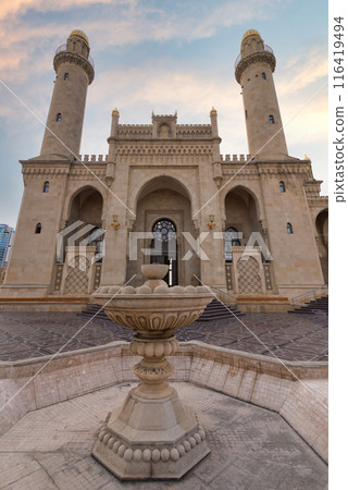 A decorative fountain stands in front of the Taza Pir Mosque in Baku, Azerbaijan 116419494