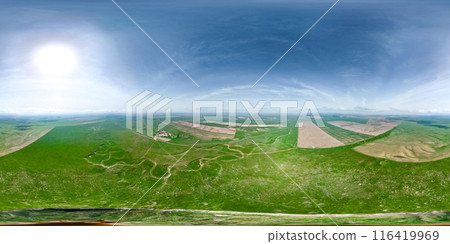 Top view of the crater from a nuclear explosion on a sunny day in spring. The aftermath of an atomic explosion, testing a nuclear bomb at the test site as seen from a drone. panorama 360 116419969