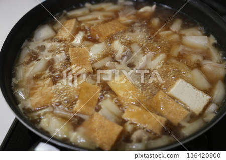 Cooking stew of chicken thighs, daikon radish and deep-fried tofu Cooking stew of chicken thighs, daikon radish and deep-fried tofu 116420900