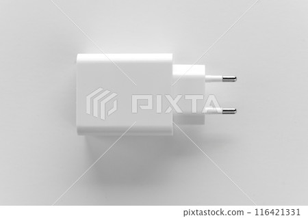 AC Charger, Adapter with USB input on a white background. 116421331