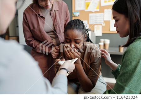 Crying woman suffering from pain Crying woman suffering from pain 116423024