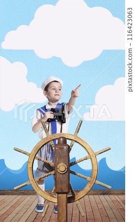 Young boy dressed as sailor standing confidently at ship helm, holding binoculars and pointing ahead. Contemporary art collage. 116423063