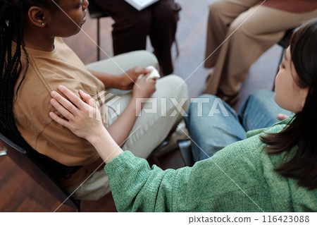 Girl comforting friend during session 116423088