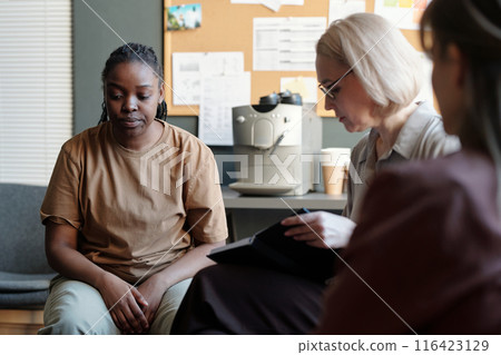 Depressed young woman at session Depressed young woman at session 116423129