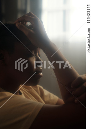 Young stressed African American woman Young stressed African American woman 116423135