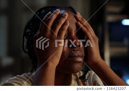 Woman touching face by hands and crying Woman touching face by hands and crying 116423207