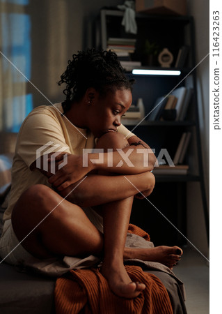 Girl suffering from insomnia at night 116423263