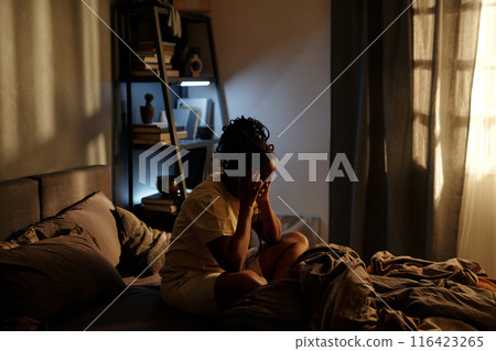 Woman suffering from insomnia or PTSD Woman suffering from insomnia or PTSD 116423265