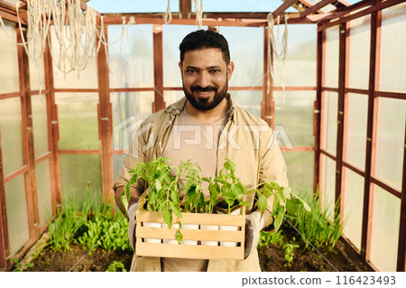 Successful male farmer in beige workwear 116423493