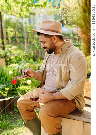 Gardener communicating in video chat 116423533